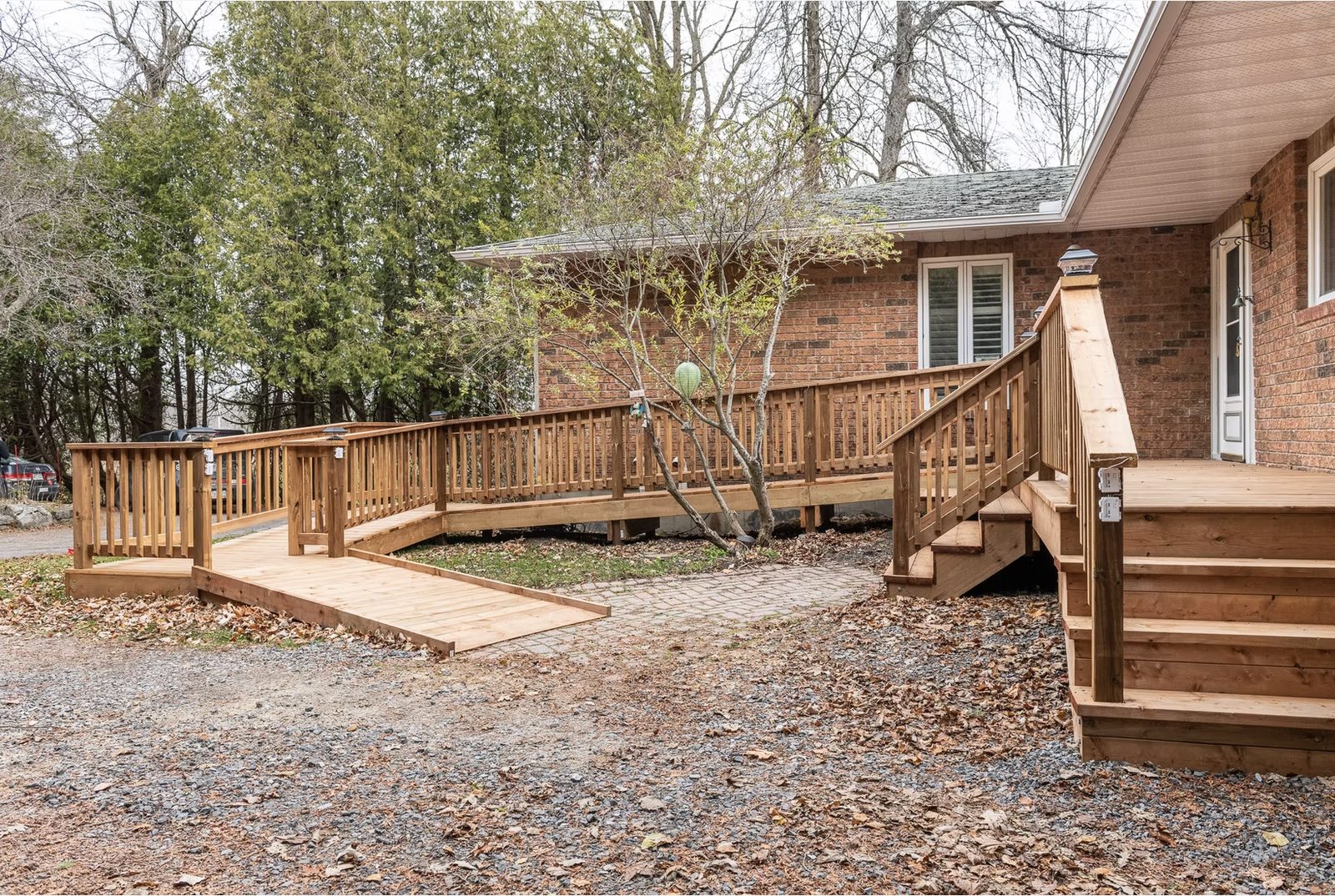Custom-built wheelchair ramp with zero-threshold entry — aging in place renovation, Markham