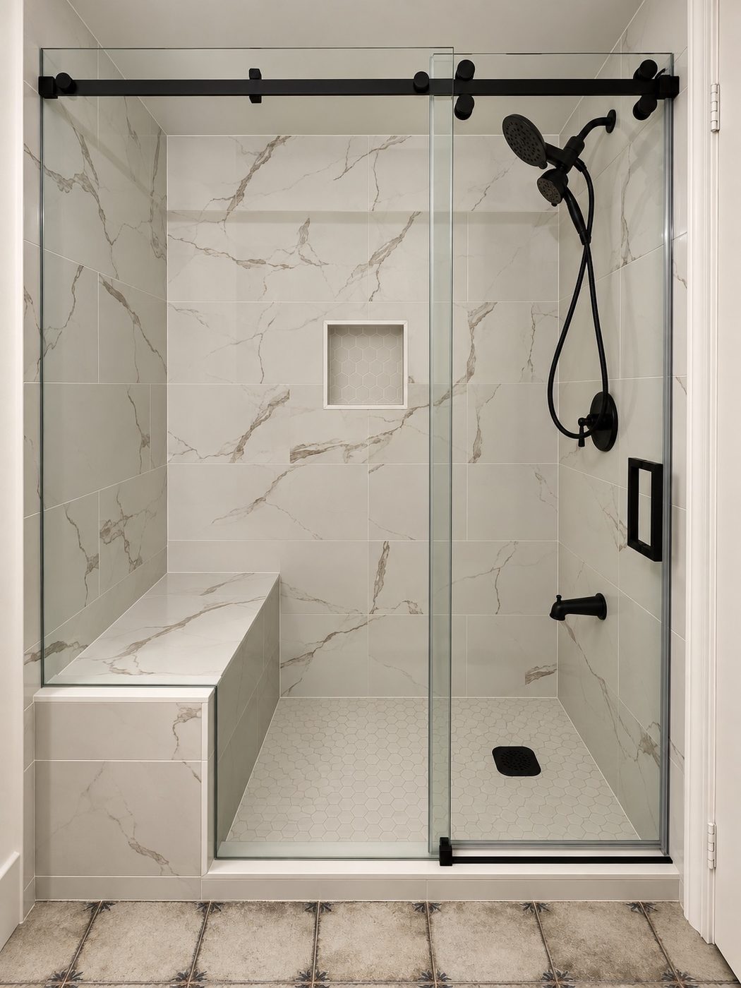 Tub-to-shower conversion with a built-in bench, marble-look tile and black fixtures, Brampton