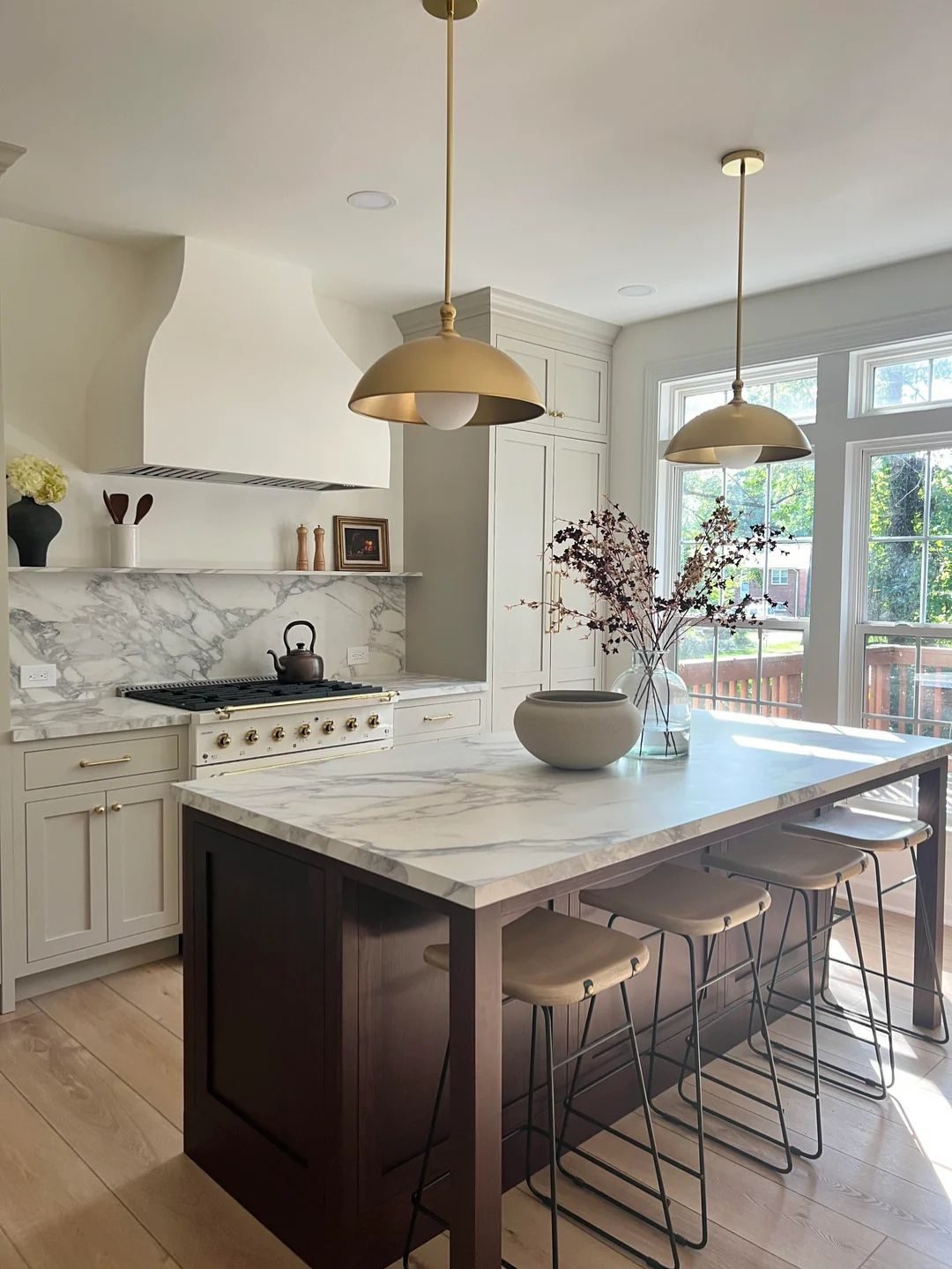 Open-concept custom kitchen with marble island and pendant lighting, Annex, Toronto