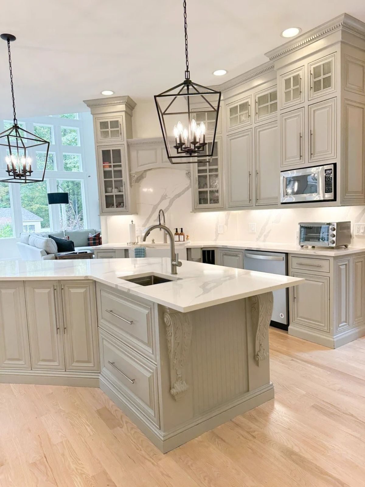 Classic white custom kitchen with marble island and lantern pendants, Richmond Hill