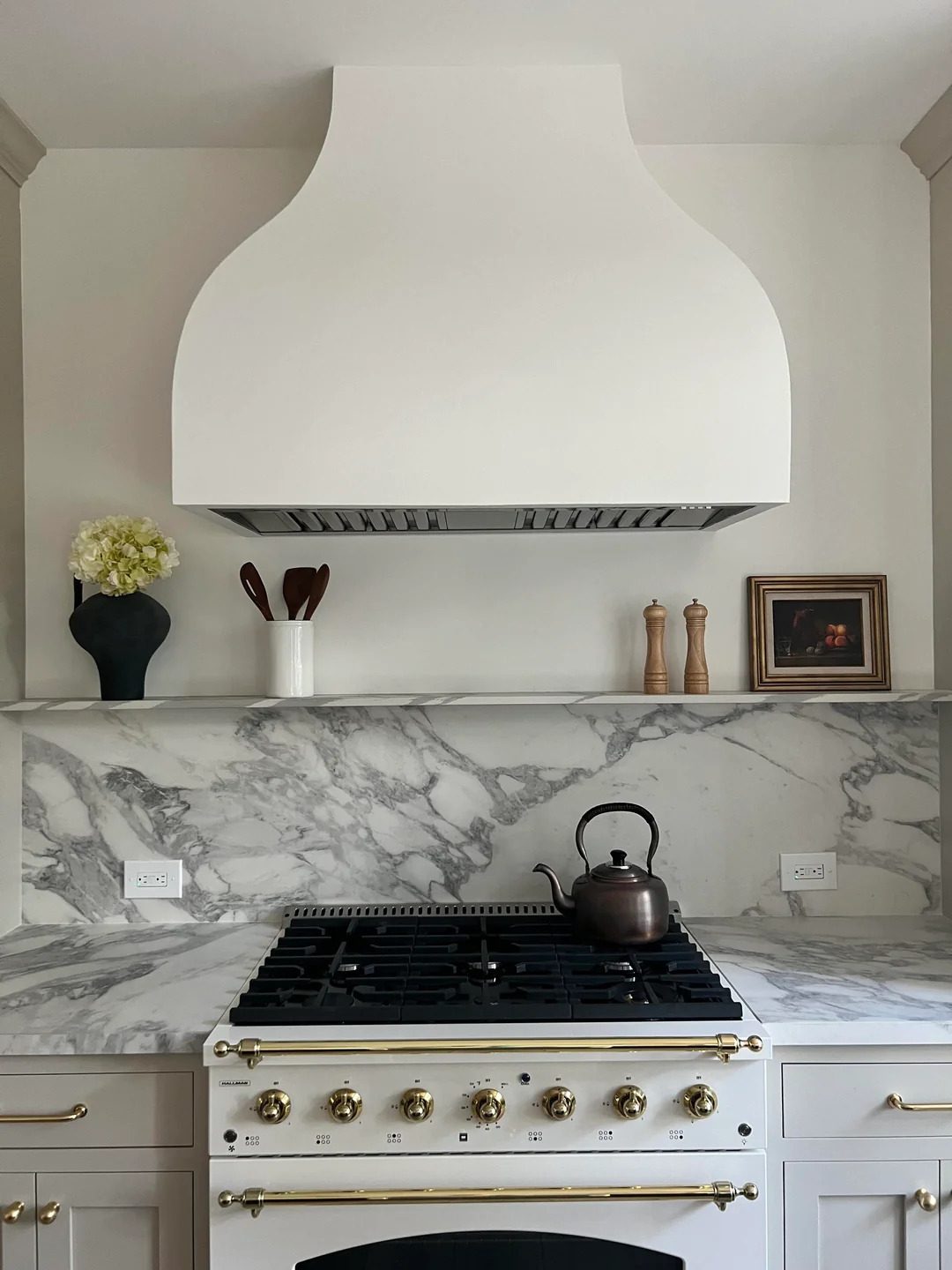 Custom range hood and marble backsplash detail — Annex, Toronto